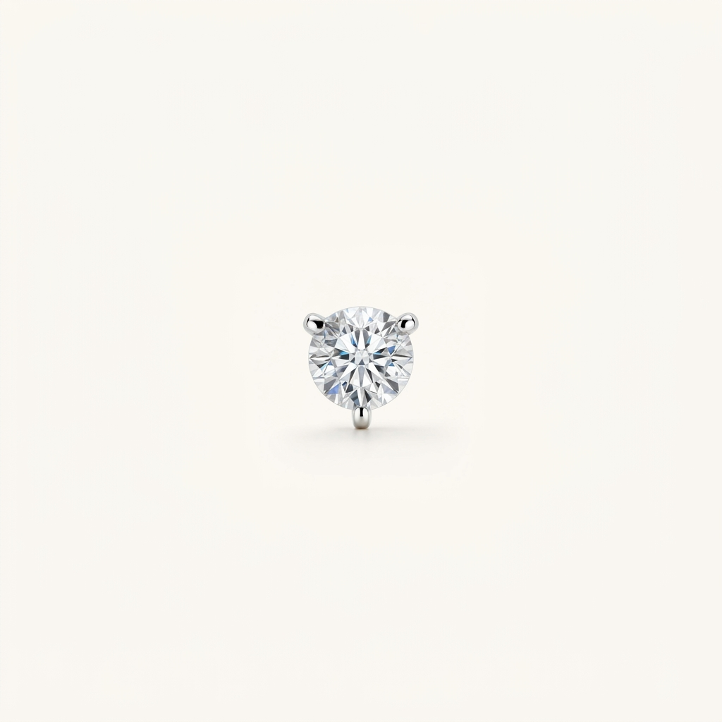 Round brilliant diamond stud earring in a three-prong martini white gold setting